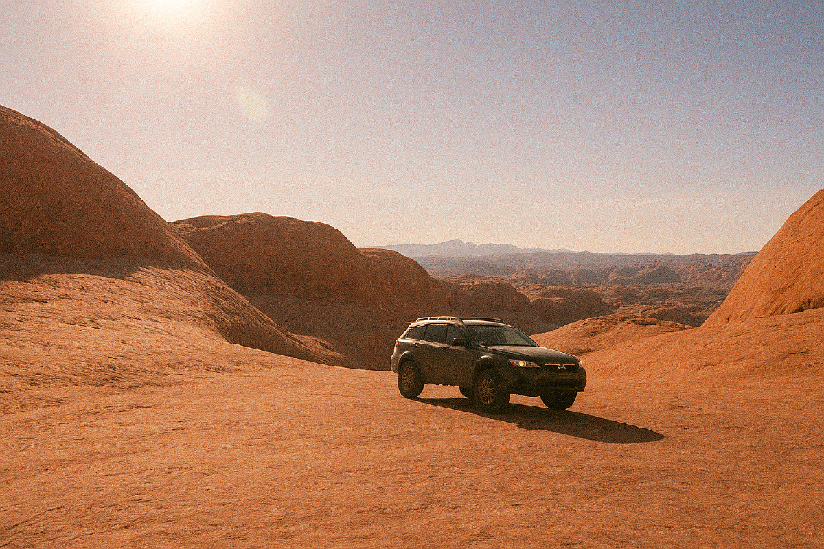 subaru on the hells revenge trail in moab